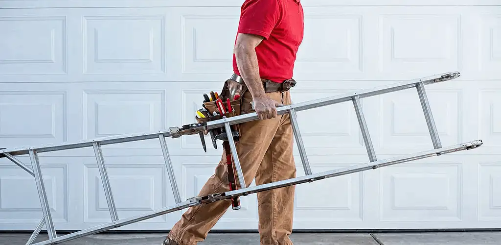 Garage door repair technician arriving with tools and ladder in Oklahoma City, OK