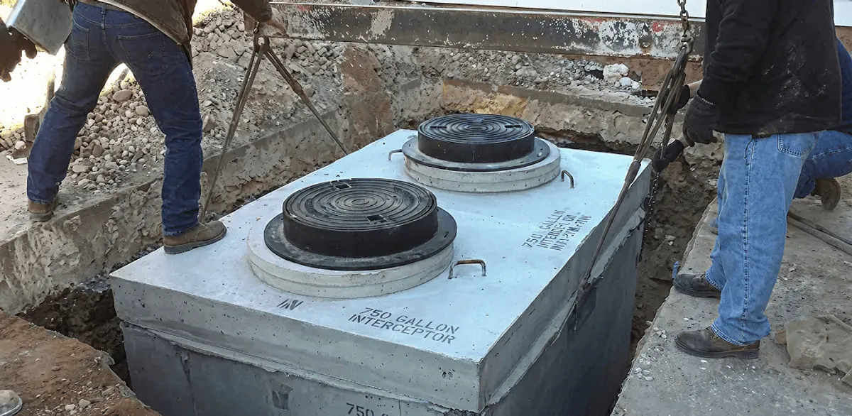 Grease trap installation for a commercial property drainage system in Oklahoma City, OK