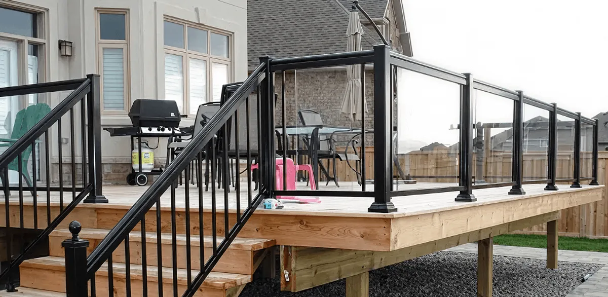 Handrail installation on a deck staircase for safety and code compliance in Oklahoma City, OK
